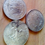 Доллары США, три монеты разных веков.
