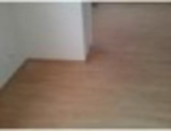 Укладка ламината.Установка плинтусов.