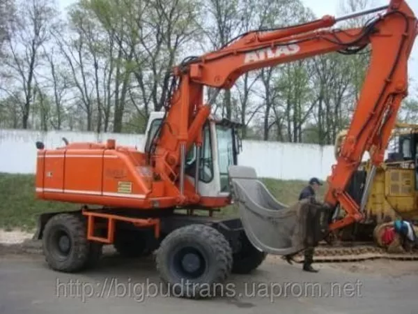 Аренда полноповоротного  экскаватора Atlas