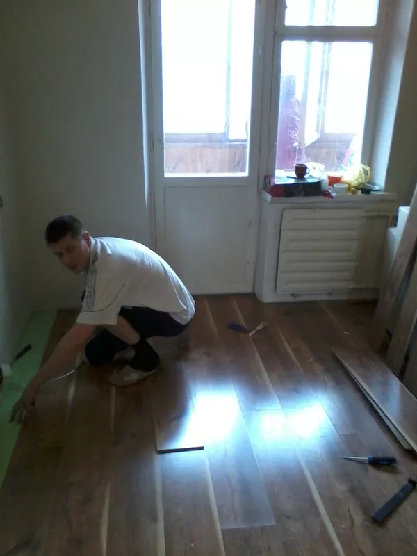 Укладка ламината,  линолеума,  ковралина  Киев