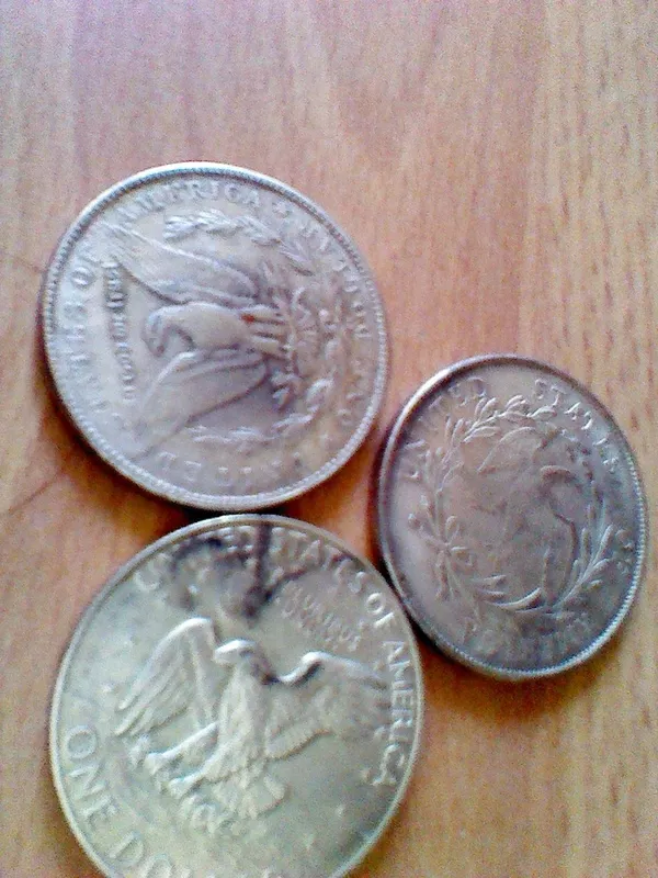 Доллары США, три монеты разных веков.